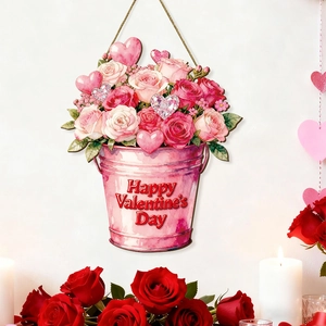 Detailed close-up of a pink Valentine's bucket door sign with roses and heart elements