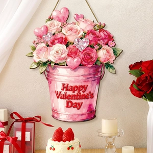 Detail of wooden Happy Valentine's Day sign with pink roses, hearts and hanging rope
