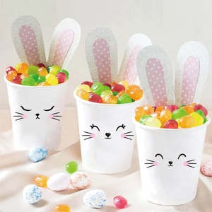 Easter bunny paper cups with polka dot ears and cute facial expressions for party treats
