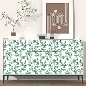Self-adhesive PVC wallpaper with green eucalyptus leaf patterns on white furniture