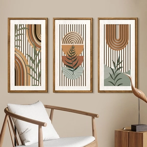Detail of three-piece bohemian wooden wall art featuring geometric and plant patterns
