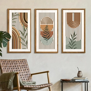 Three-piece set of bohemian wall art with wooden frames in a minimalist living room