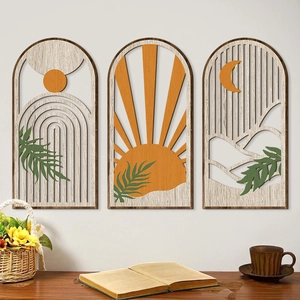 Three-piece arched wooden wall art set with sun, moon and mountain laser-cut designs