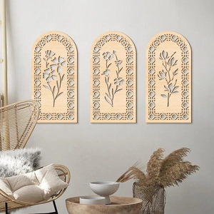 Detailed laser-cut wood flower patterns on boho arch wall panels for home decor