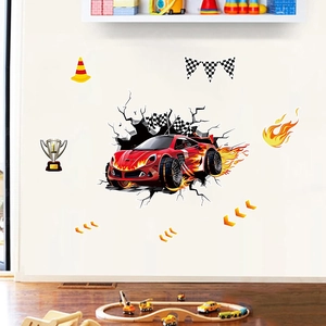 Detail of red racing car wall sticker with flames and checkered flags in a kids bedroom