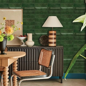 Glossy dark green rectangular marble-style self-adhesive wall tiles in subway pattern