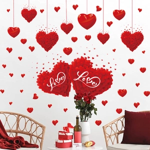 Red heart PVC wall decals for Valentine's home decor featuring Love script and romantic style