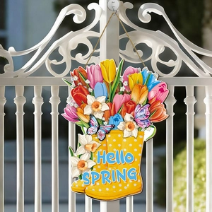 Detail of wooden welcome sign with yellow polka dot rain boot and spring tulip flowers