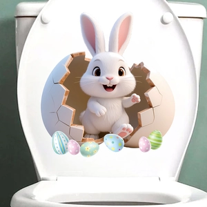 3D Easter bunny breaking egg shell sticker applied on a white toilet lid surface
