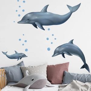 Waterproof PVC wall decals featuring realistic dolphins and blue bubbles for bathroom decor