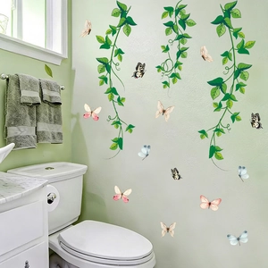 Self-adhesive green hanging vines and colorful butterfly wall stickers for home decor