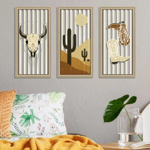 Detail of vintage western wooden wall decor featuring cactus and bull skull art