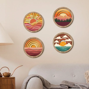 Set of 4 circular 3D layered wood wall art with boho sun and mountain landscape