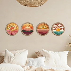 Set of 4 geometric wooden wall art pieces with layered sun, mountain, and forest scenes