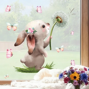 Easter bunny window sticker with pink butterflies and green grass on glass pane