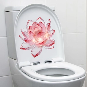 Détail d'autocollant de toilette lotus rose avec effet 3D sur abattant en céramique