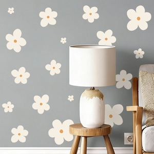 Daisy floral PVC wall stickers showing white flowers on a grey living room wall