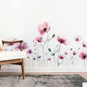 Detail of watercolor pink poppy wall stickers applied on a minimalist white living room wall