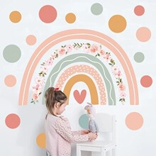Detail of boho rainbow wall decal with floral garland and dots in soft Morandi colors