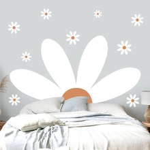 Detailed view of bohemian daisy arch wall stickers on a modern bedroom wall surface