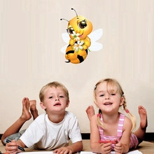 Nursery wall sticker featuring a cute yellow bee character with children looking up at it