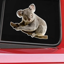 Realistic 3D koala wall decal sticker on a black car window with white border detail