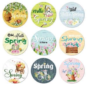 Set of 9 Spring Garden round welcome door plaques with floral, bee, and bird nest designs