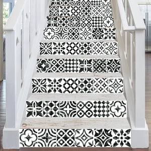 Black and white mandala tile stickers for stairs and wall decoration in a DIY set