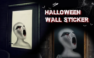 Detail of Halloween window sticker showing a screaming pale ghost face with bloody effects