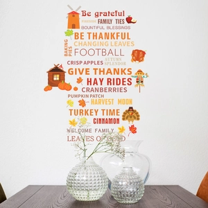 Detailed view of fall harvest wall decals with pumpkin and autumn leaves on white wall
