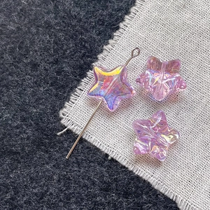 Macro shot of colorful aurora star-shaped glass beads for DIY jewelry making