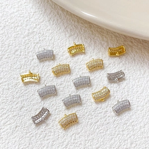 Curved tube pendant connector with micro-pave zircons in gold and silver plating