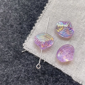 Detailed macro view of purple iridescent shell beads for DIY jewelry making and crafts