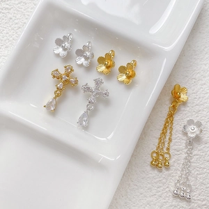 Gold and silver DIY jewelry pendants with flower, cross, and tassel zircon details
