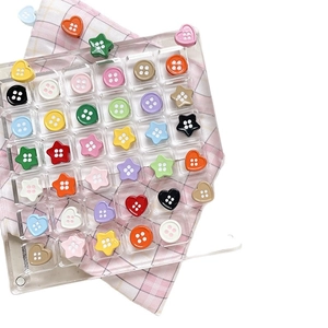 Colorful DIY star heart button beads for handmade jewelry on pink checkered background