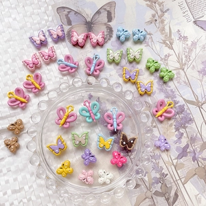 Colorful resin butterfly beads in multiple vibrant shades for DIY jewelry and hair accessories