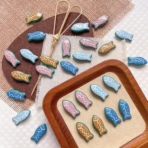 Colorful striped tropical fish beads for DIY jewelry making in various vibrant colors