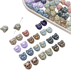 Czech vintage glass cat head beads in various colors for DIY jewelry making and crafts