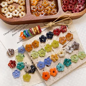 Handmade hollow glass flower beads with marble texture for DIY jewelry crafts