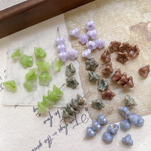 Handmade flower shaped glass beads in assorted colors for vintage jewelry DIY crafts