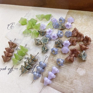Handmade Czech glass beads in floral bell shapes with vintage gradient finish for DIY jewelry