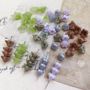 Detailed macro view of vintage mottled glass flower beads for DIY handmade jewelry crafts