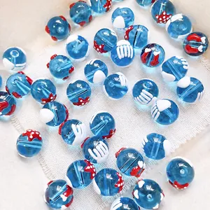 Hand-painted blue jellyfish and starfish glass beads for DIY jewelry making