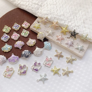 Pendentifs de bijoux DIY en alliage aux motifs d'étoiles de mer et de fleurs aux tons pastel