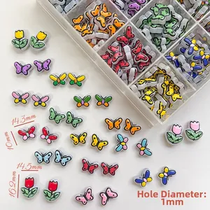 Detailed view showing 14mm butterfly and tulip glass beads with a 1mm hole diameter
