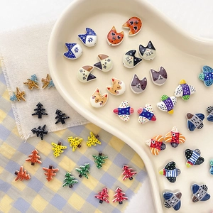 Colorful handmade ceramic beads in cat and bird shapes for DIY jewelry making
