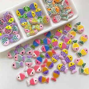 Colorful handmade fish-shaped ceramic beads for DIY jewelry with hand-painted patterns