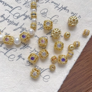Cuentas espaciadoras huecas bañadas en oro de 18k con circón de colores para bisutería