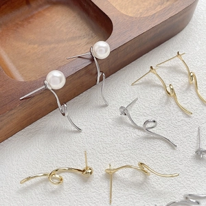 Minimalist geometric curved pearl stud earrings in gold and silver finish for women