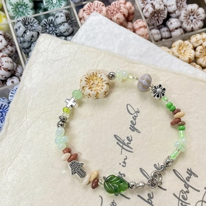 Vintage floral handmade beaded bracelet with Czech glass beads and silver charms